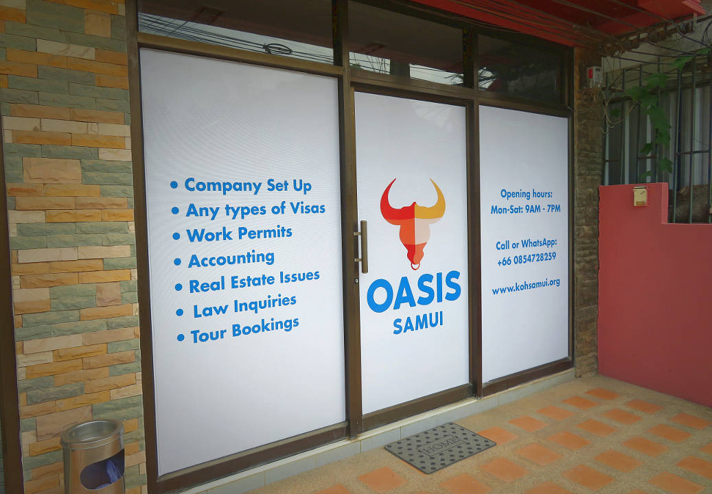 The entrance to the office with logo and information The entrance to our office