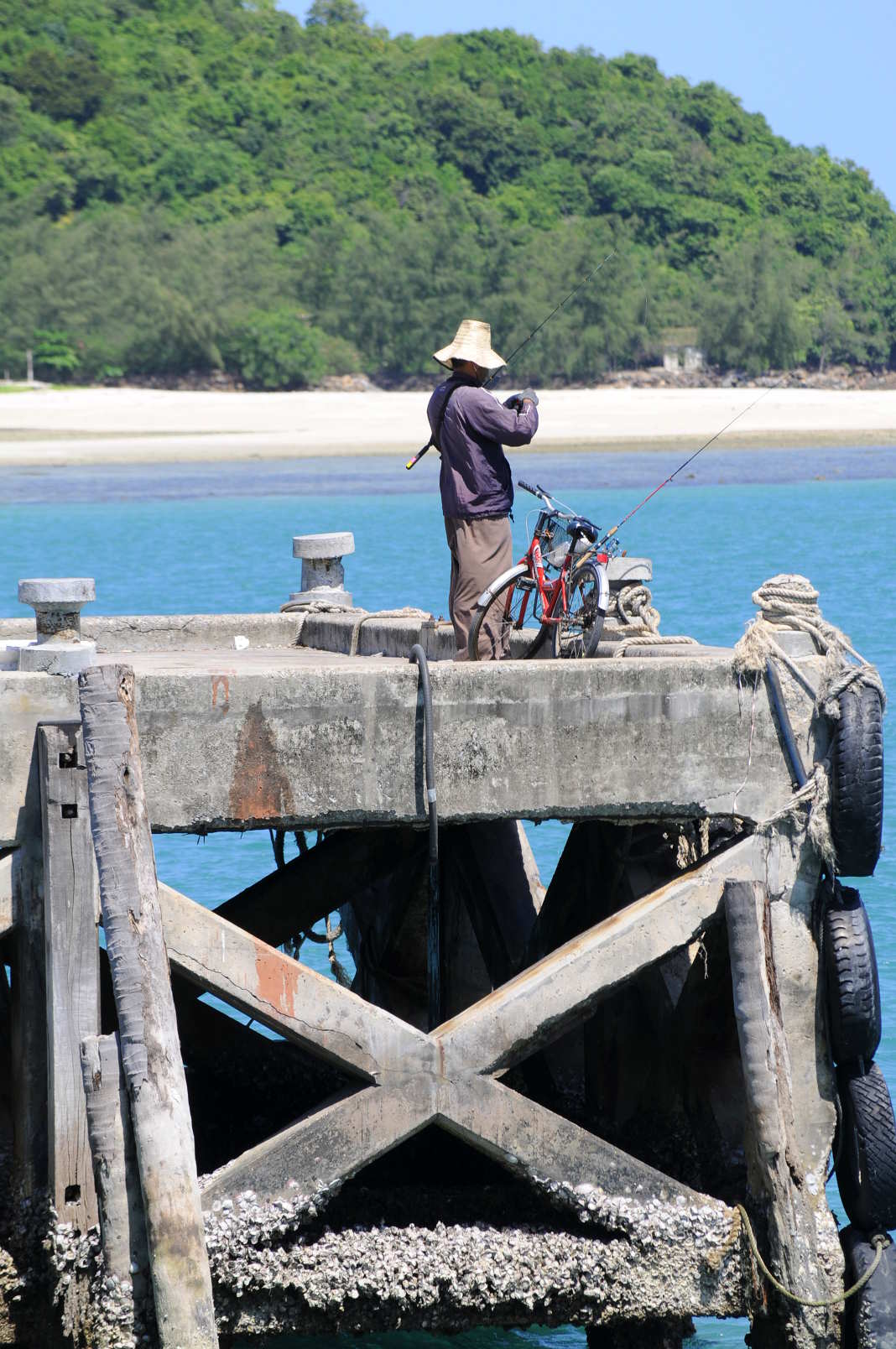 A fisherman in Thong Sala, on the west coast of Phangan island Fisherman in Thongsala, Koh Phangan